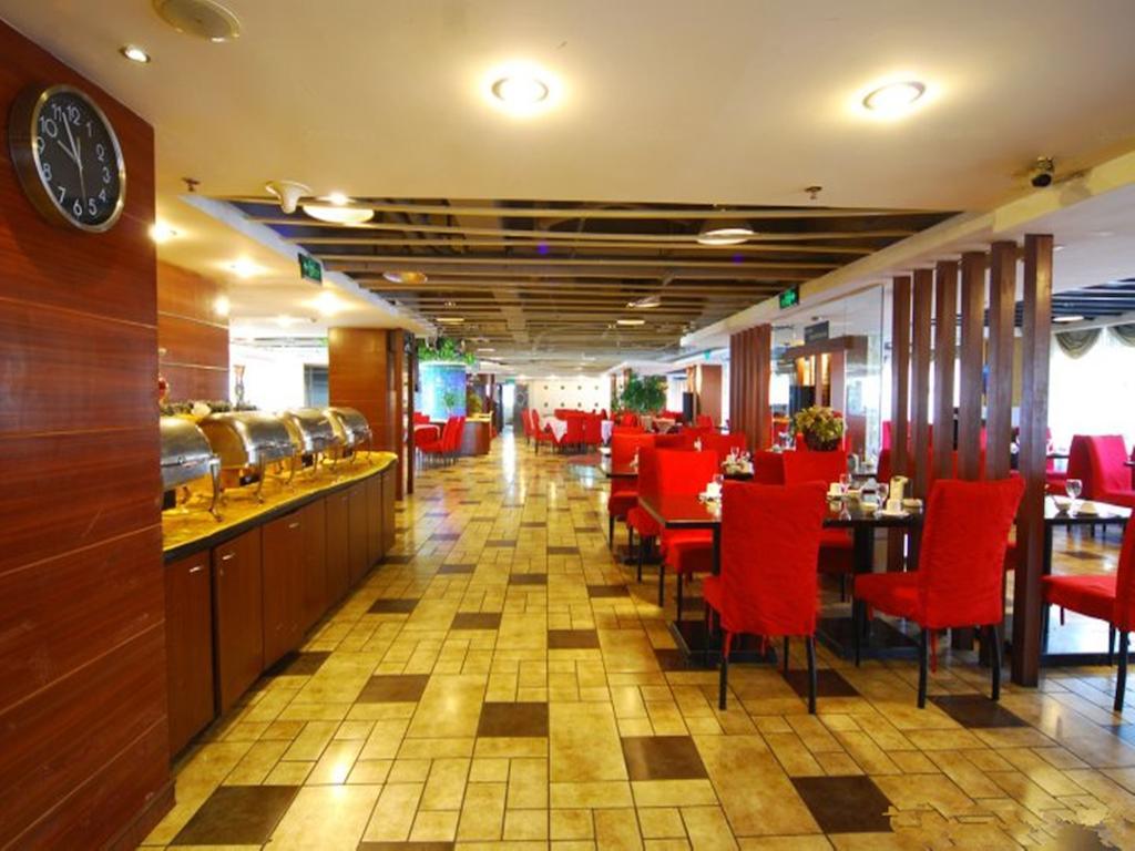 Tangyin Hotel Далиен Екстериор снимка