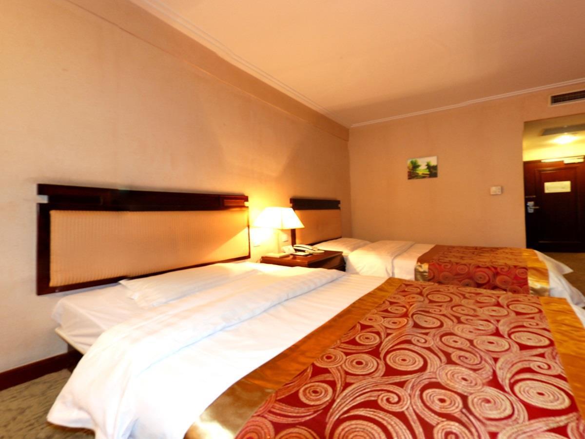 Tangyin Hotel Далиен Екстериор снимка