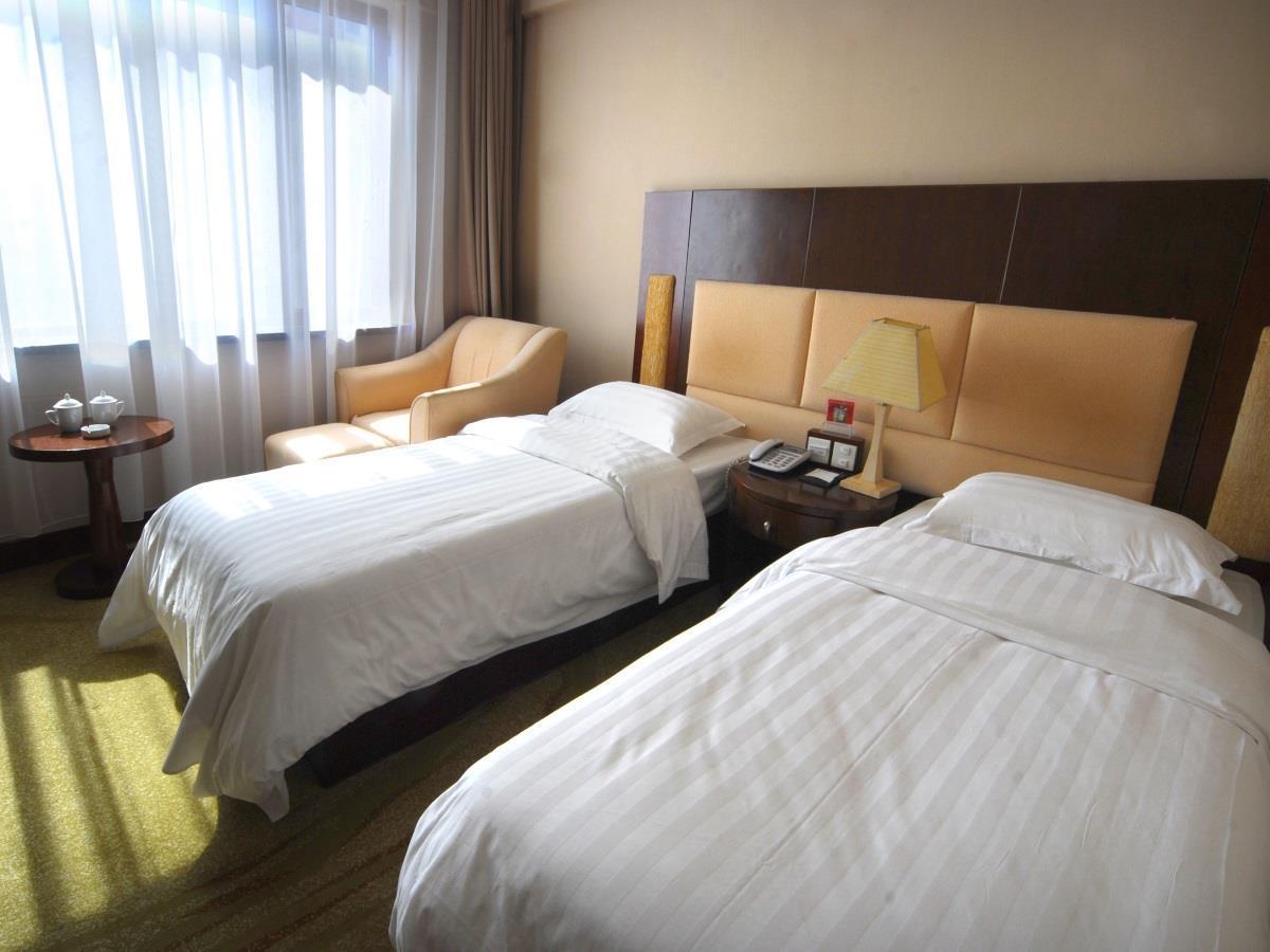 Tangyin Hotel Далиен Екстериор снимка