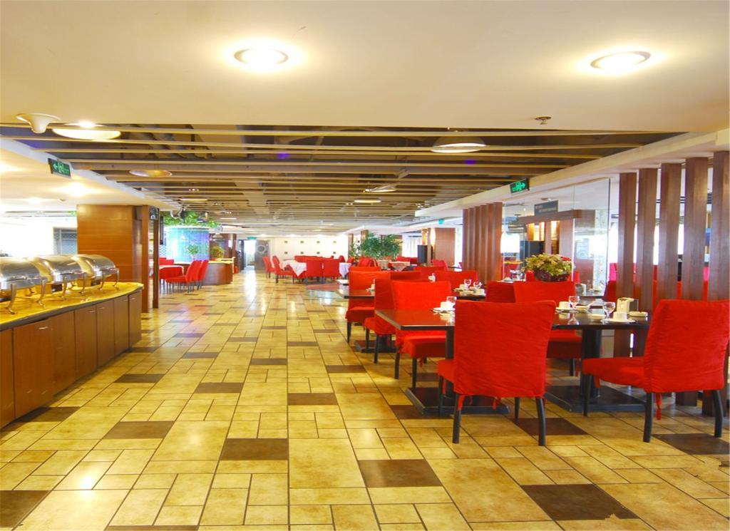 Tangyin Hotel Далиен Екстериор снимка