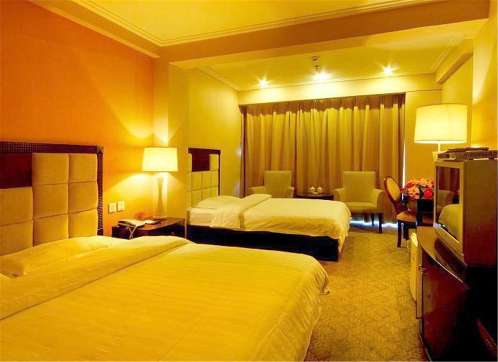 Tangyin Hotel Далиен Екстериор снимка