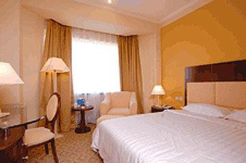 Tangyin Hotel Далиен Екстериор снимка