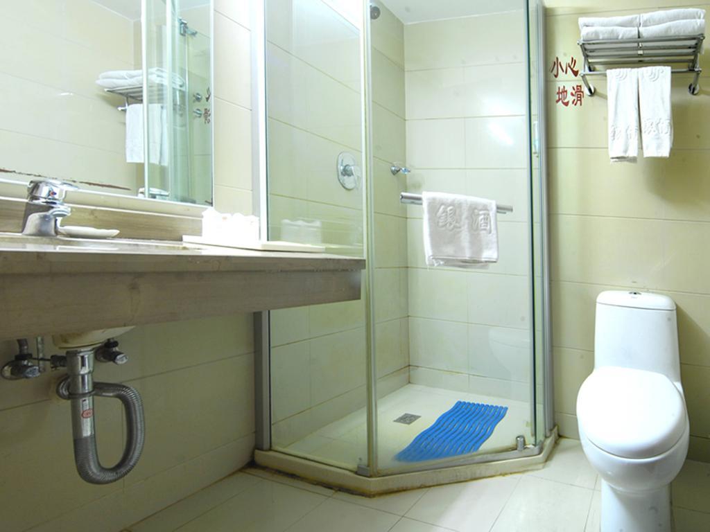 Tangyin Hotel Далиен Стая снимка